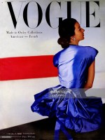 Model Dorian Leigh seen from rear wearing blue gown *** Local Caption *** Dorian Leigh;